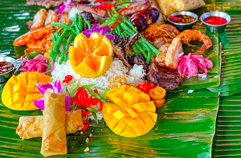 Sit Down For A Family-Style Filipino Feast At This Tropical Bar And Restaurant