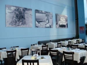 Seating and Italy-inspired artwork at Perbacco in Houston