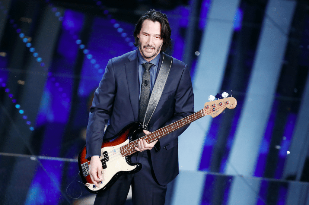 Keanu Reeves Plays Football With Young Houston Fan Before Concert